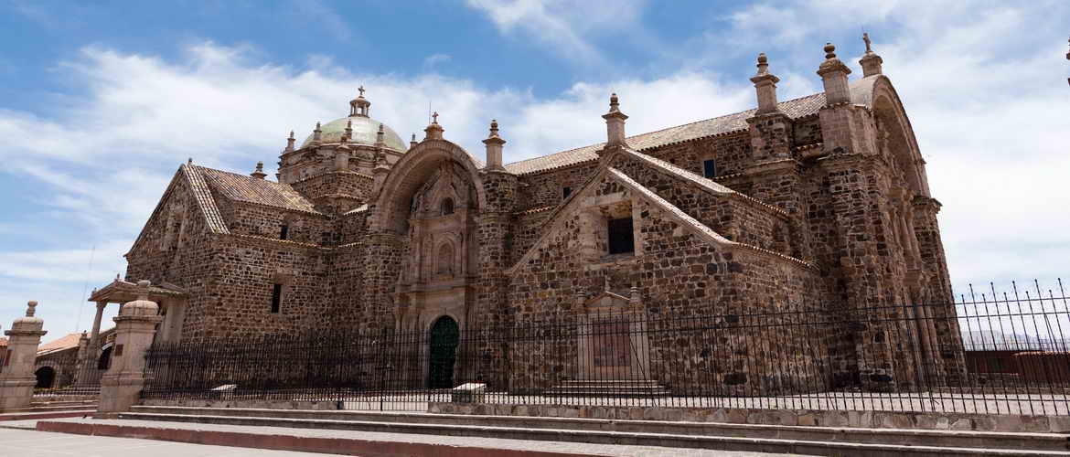 Full day private tour in Puno with Quechua Route. Lampa, Tarucani, Tinajani and Pucara