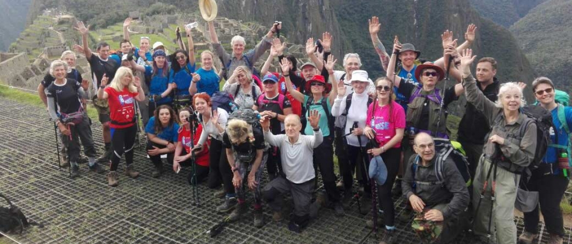 Just Enjoy Peru travelers in Machu Picchu